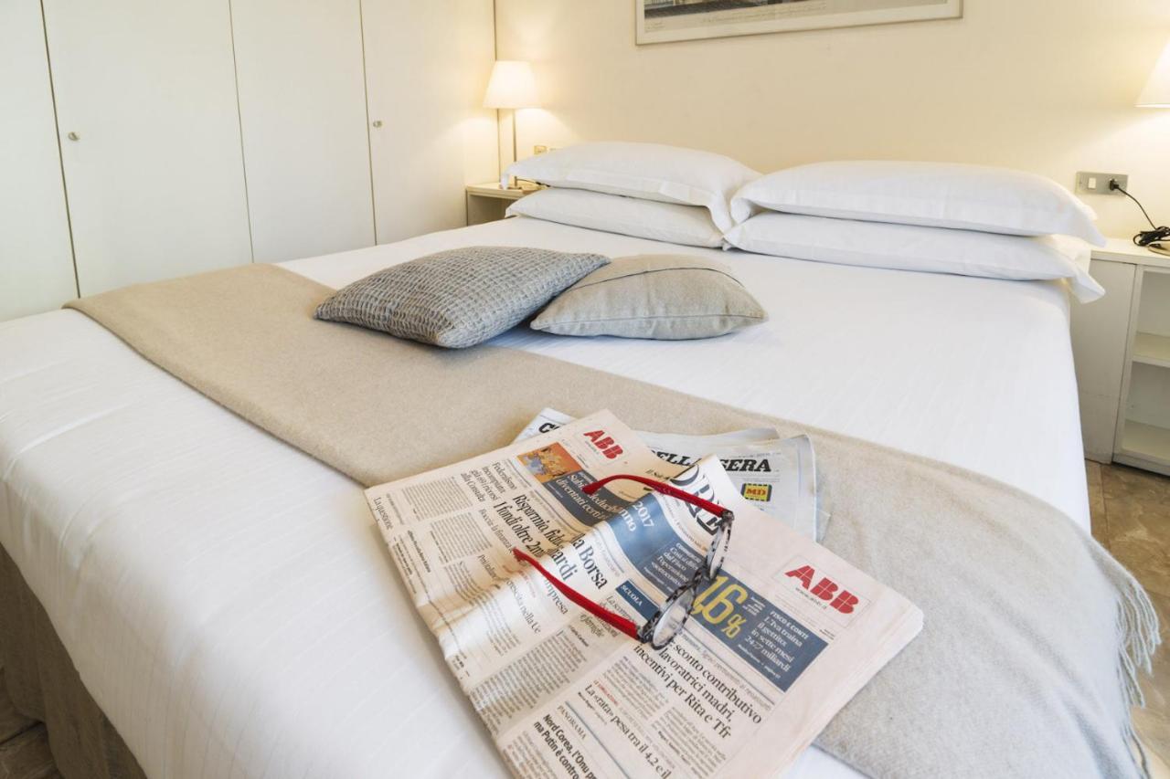 Contempora Apartments - Elvezia 8 - E24 ミラノ エクステリア 写真